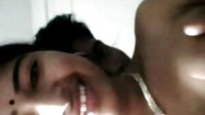 බි